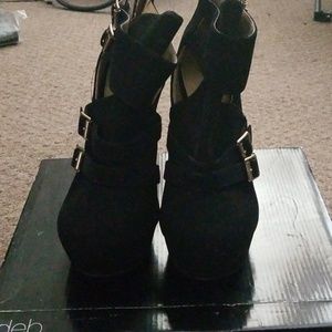 Black gold buckle heels